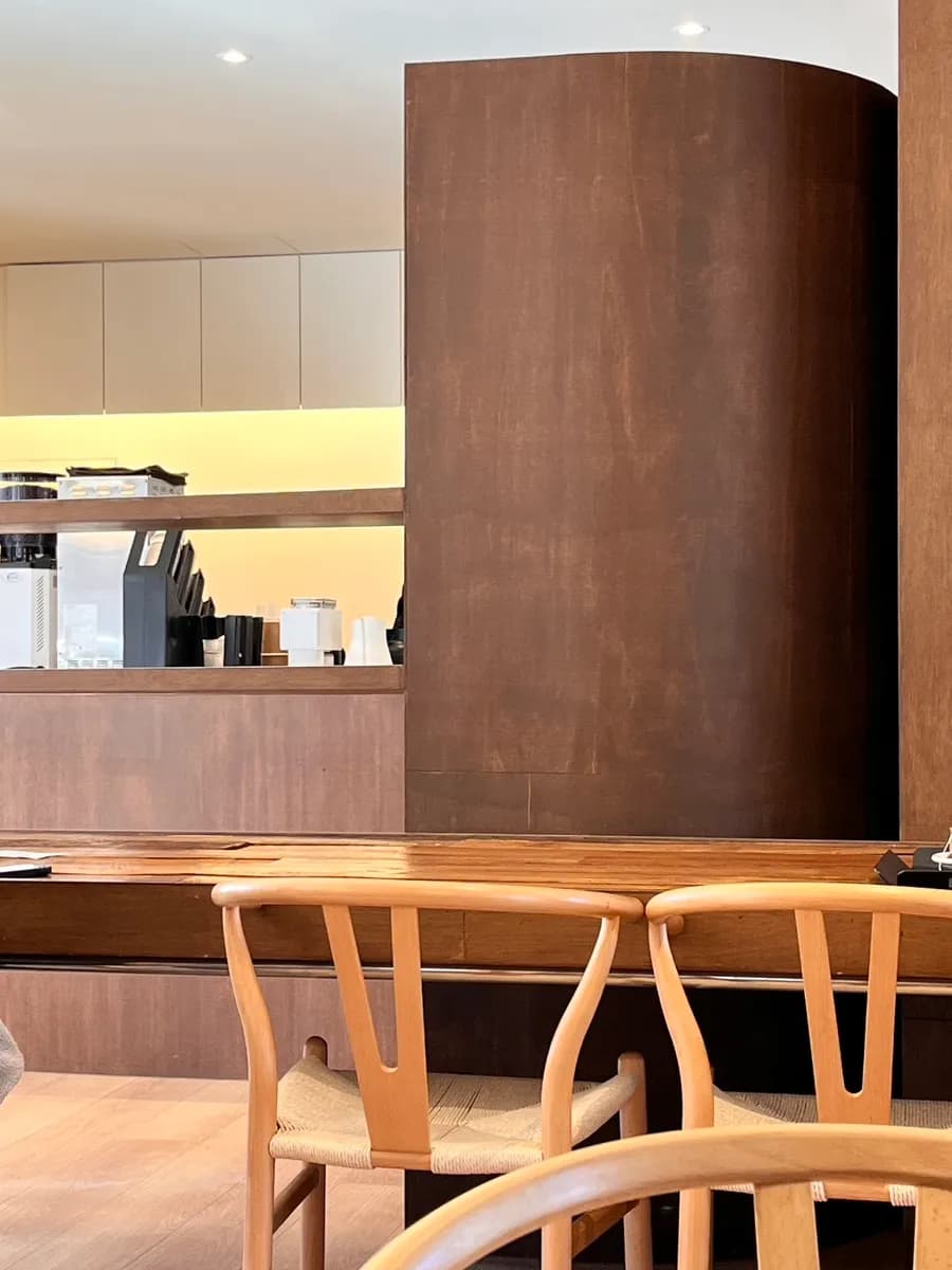 Warm interior seating and wall speaker at Gravie cafe