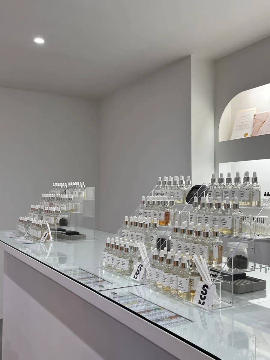 Clean laboratory-style interior at Some Scent