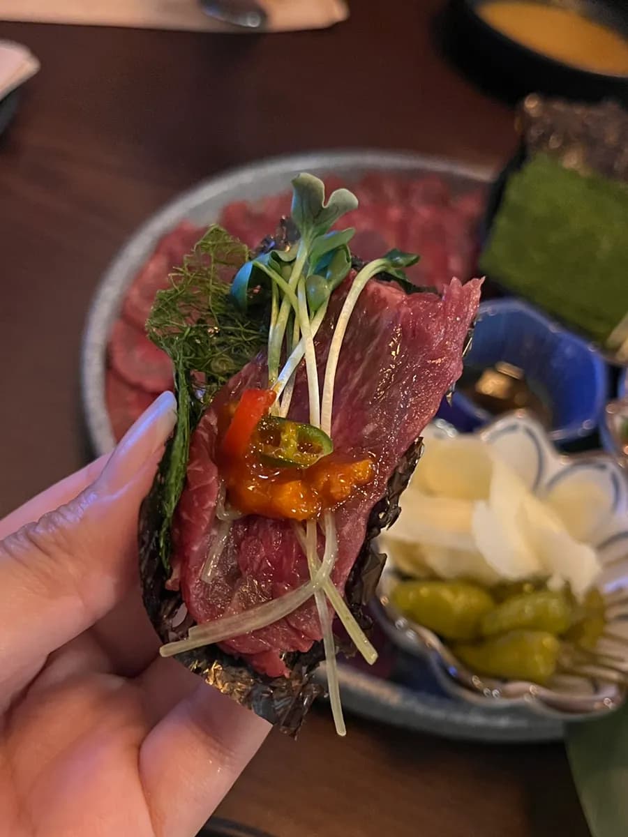 Hanwoo beef sashimi served with gamtae and extra wasabi