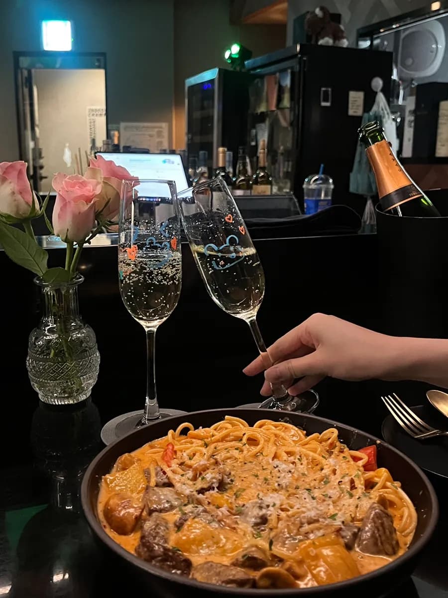 Sparkling champagne served with pasta at Indeogwon Champagne