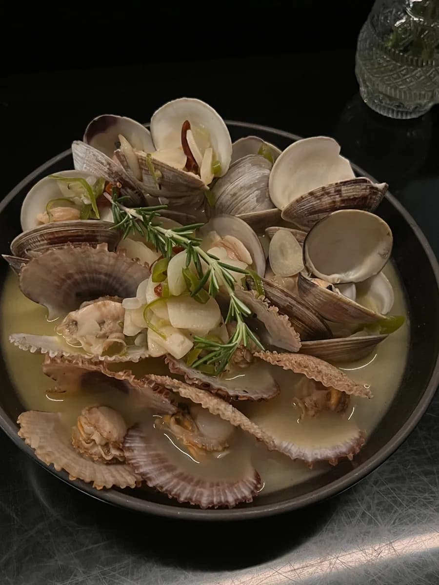 Spicy clam stew with clear broth and assorted clams
