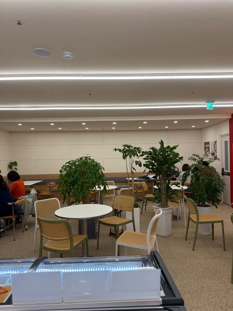 Spacious cafe area with various tteok sold after the meal