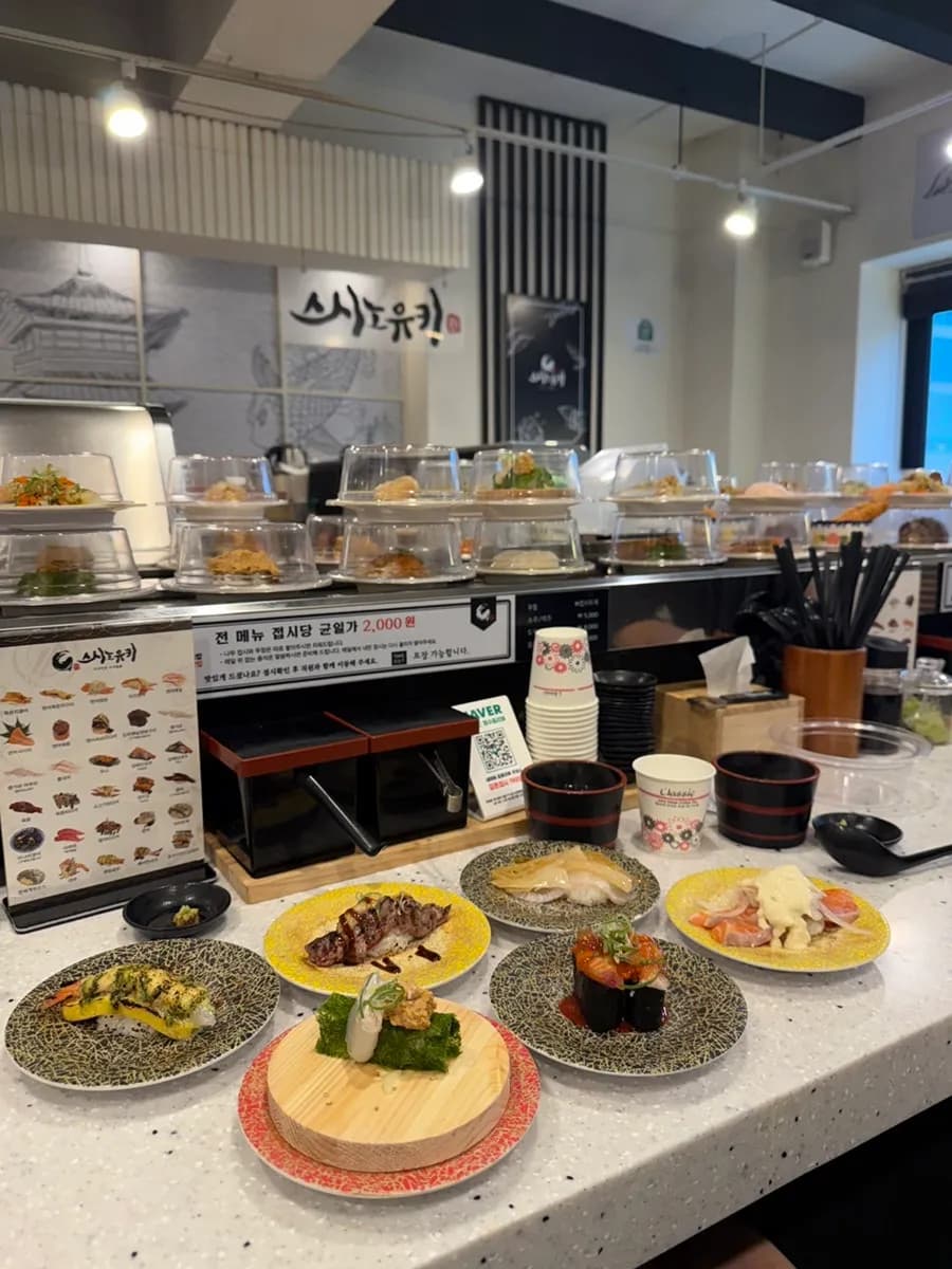 Assorted sushi plates at Sushino Yuki including shrimp, salmon, flounder, and ankimo