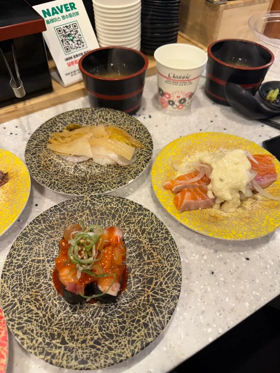 Ankimo sushi and assorted sauces at Sushino Yuki Sanbon