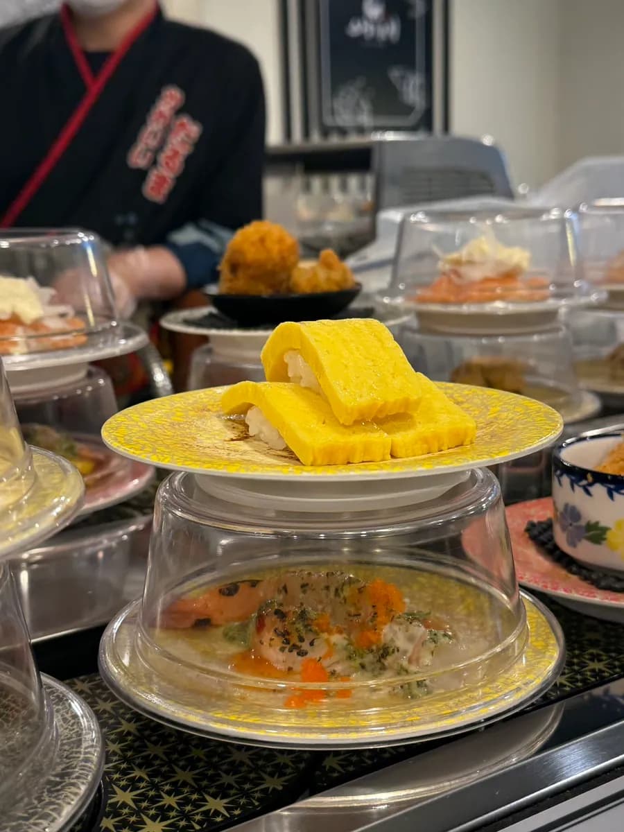 Three-piece egg sushi plate at Sushino Yuki conveyor belt sushi restaurant