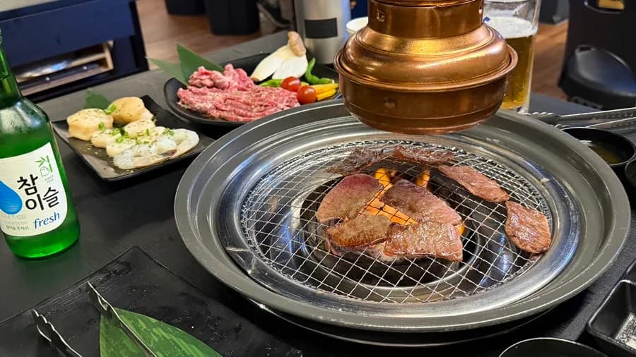Yakiniku grilled over a briquette fire at Yakiniku Yoshi