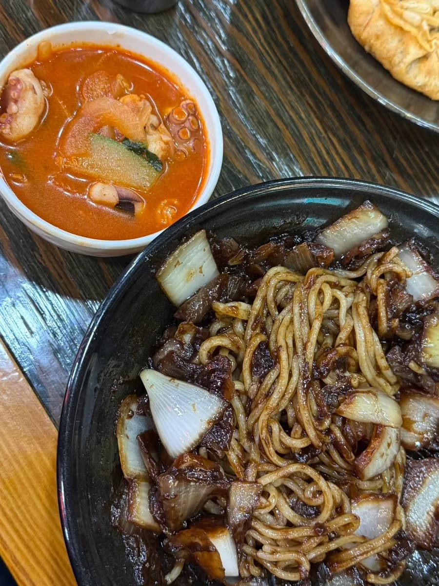 Gan-jjajang enjoyed with jjamppong broth and red pepper powder