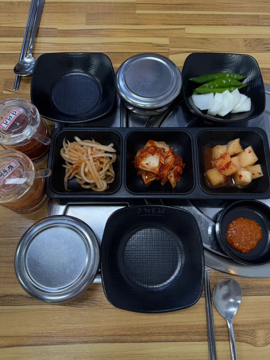 Cream sundae-guk, spicy sundae-guk, and perilla oil makguksu order at Gogidori