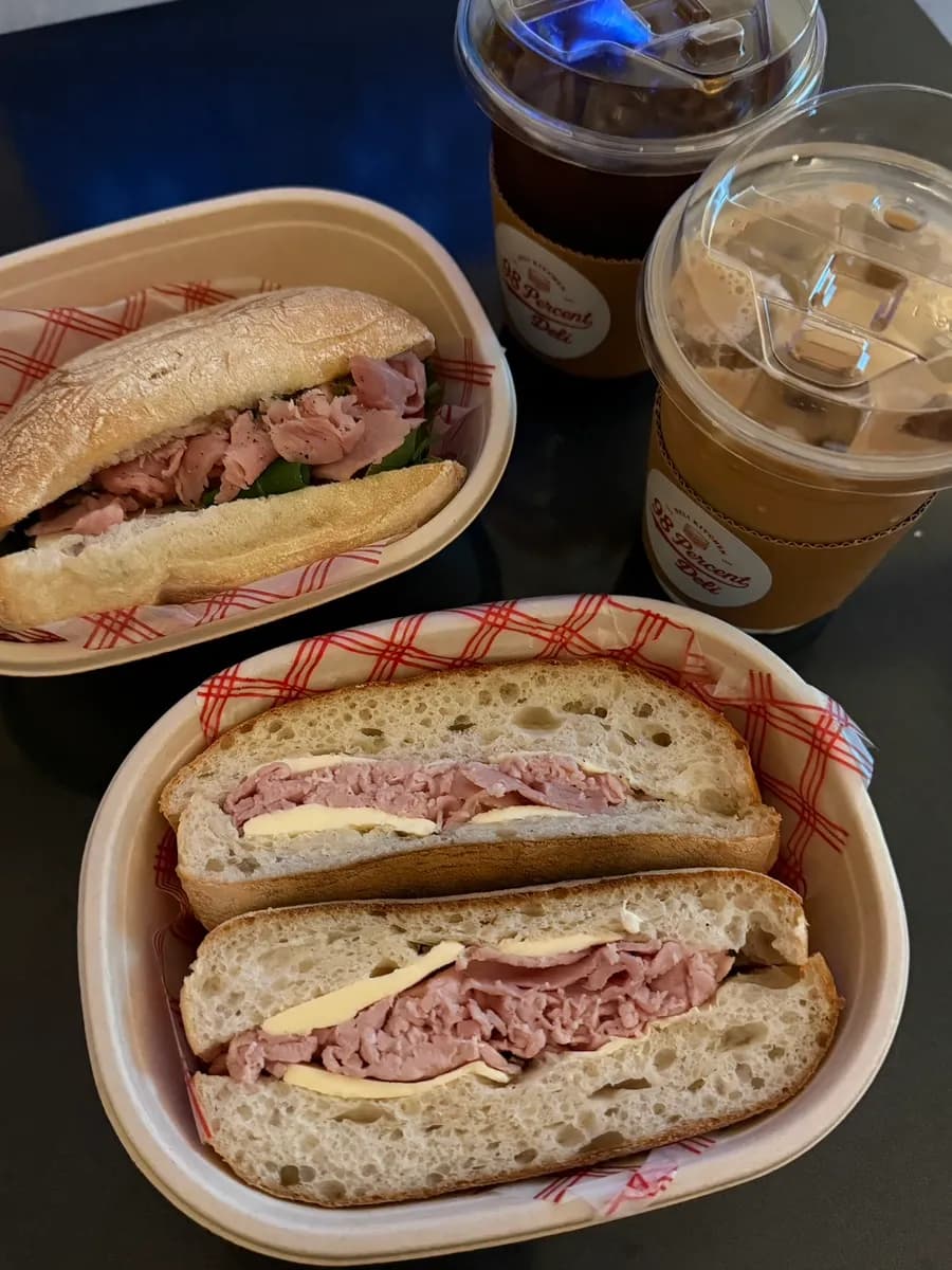 Takeout coffee and sandwiches from 98 Percent Deli