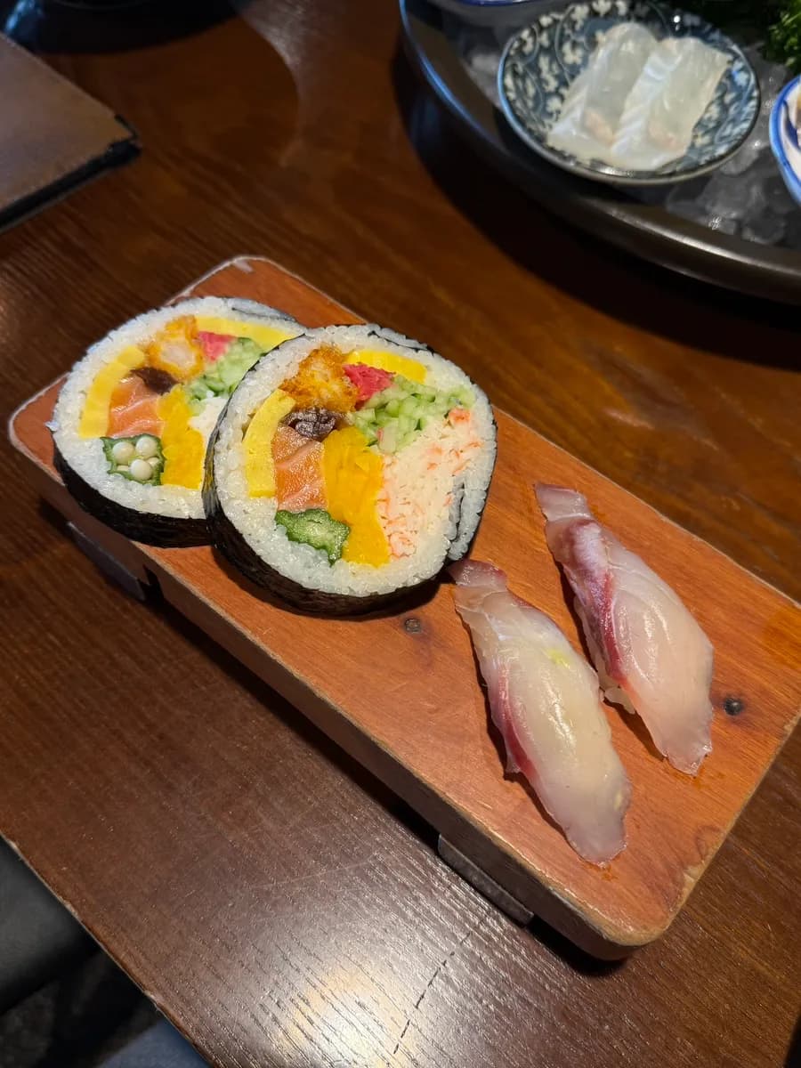 Aged sashimi topped with ankimo and wasabi in the omakase set