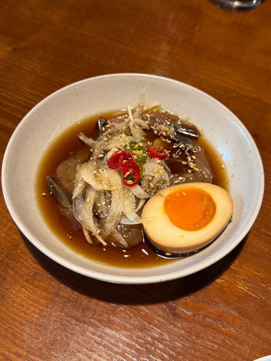 Large futomaki served as part of the sashimi omakase course