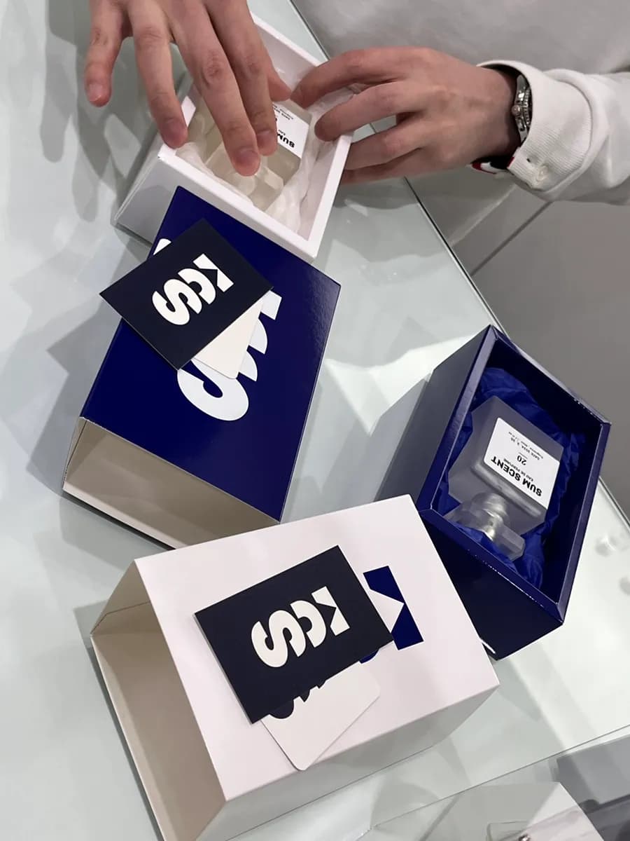 Finished perfume being packaged after the workshop