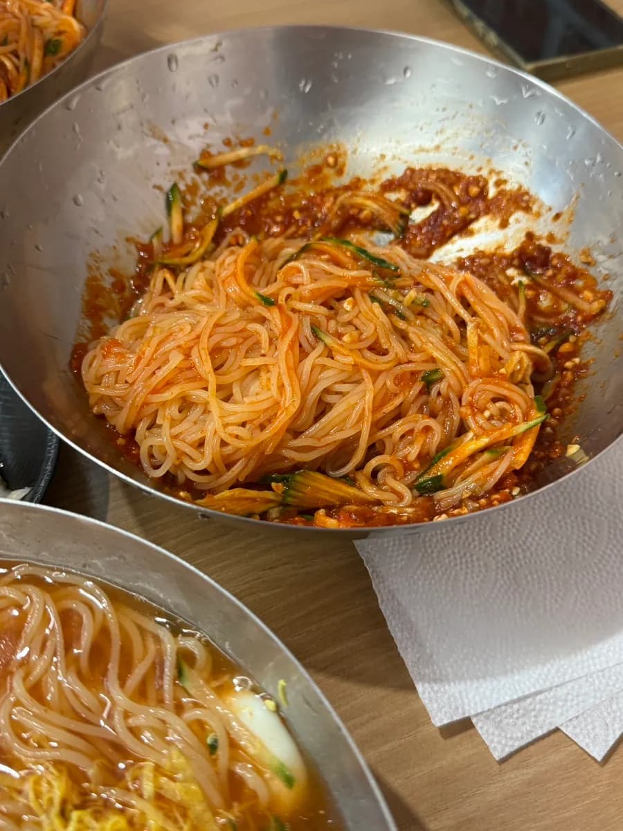 Milmyeon at Busan Gaya Milmyeon with icy broth, generous toppings and seasoning